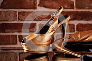 Gold high heels