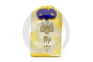 Gold japanese luck omamori amulet on white background