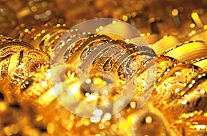 Gold jewelry background / selective focus photo