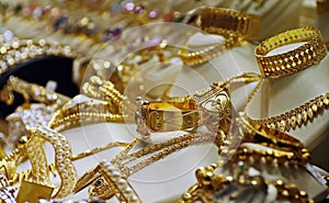 Gold jewellery for sale in shop photo