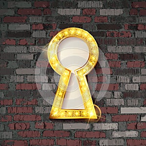 Gold keyhole on old brick wall background.