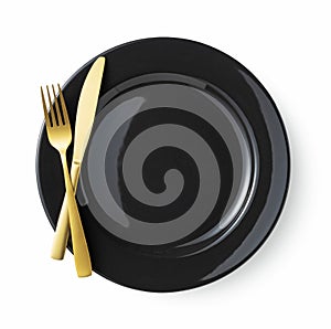 Gold knives and forks on a white background, empty black plate. Beautiful gold cutlery