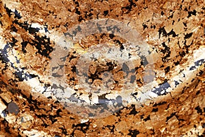 The gold leaf on the back of Buddha statue in temple of Thailand.