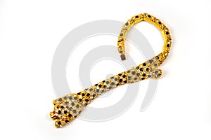 Gold leopard bracelet with shiny pebbles, lepard eyes made of bright red stones