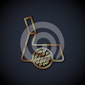Gold line Golf club with ball icon isolated on black background. Vector