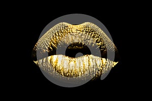 Gold lips. Woman wouth close up with golden color lipstick on lip. Glitter glossy lips biting.