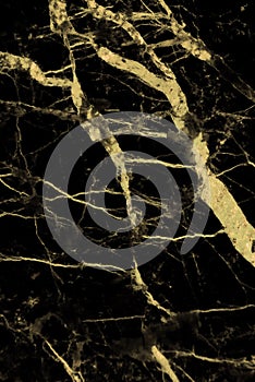 Gold marble texture with natural pattern for background or design art work.