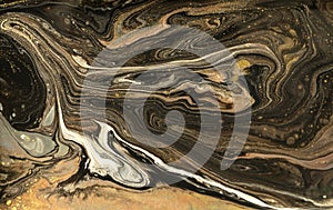 Gold marbling texture design. Beige and golden marble pattern. Fluid art.