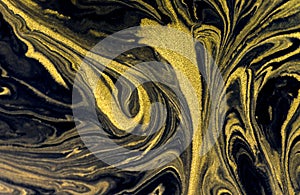 Gold marbling texture design. Beige and golden marble pattern. Fluid art. Dust, water.