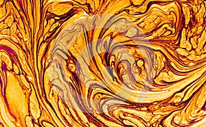 Gold marbling texture design. Beige and golden marble pattern. Fluid art. Effect, glitter.