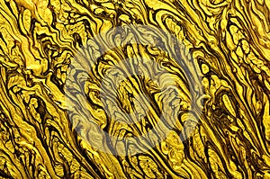 Gold marbling texture design. Beige and golden marble pattern. Fluid art. Effect, glitter.