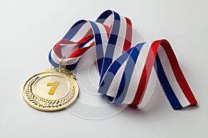 Gold medal. First place award with ribbon