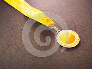Gold medal for the first place winner. Concept of success photo