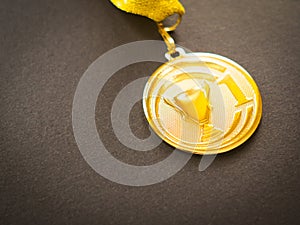 Gold medal for the first place winner. Concept of success photo