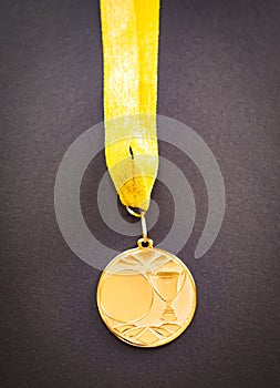 Gold medal for the first place winner. Concept of success photo