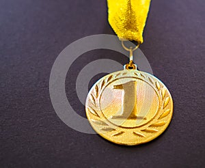 Gold medal for the first place winner. Concept of success photo