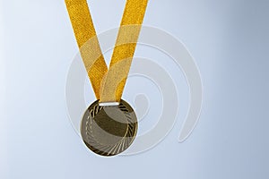 Gold medal on white background concept for winning