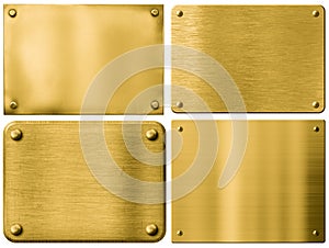 Gold metal plates or signboards set with rivets