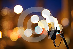 Gold Mic on bokeh background