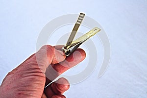 Gold nail clippers one handed