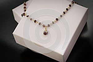 gold necklace set with Bordeau stones