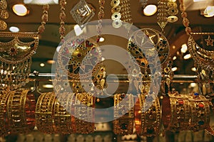 Gold necklaces and bracelets on the window display