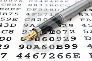 A gold-nibbed pen and encrypted data