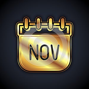 Gold November calendar autumn icon isolated on black background. Vector