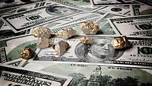 Gold nugget lies on dollars