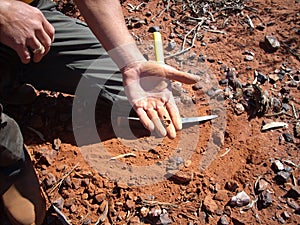 Gold nugget in a man`s hand of 11g found on the goldfields of Western Australia.