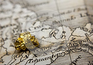 Gold-nugget and a map of Mexico