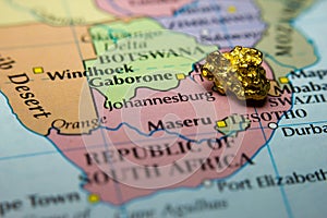 Gold nugget and map of South Africa