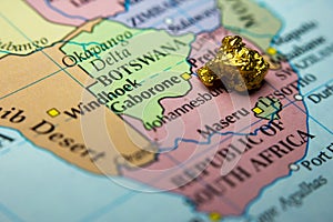 Gold nugget and map of South Africa