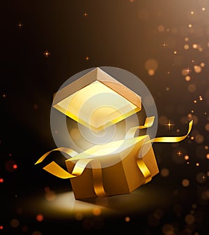 Gold open gift box with magical light