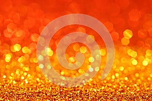 Gold Orange Graduated Glitter Background with bokeh