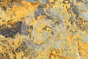 Gold ore texture. Gray stone background. Grunge stone surface