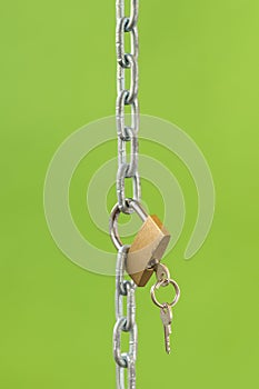 Gold padlock with key and chain