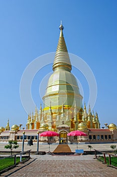 The gold pagoda under clear sky