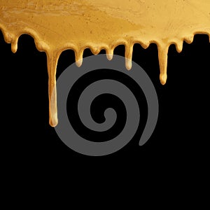 Gold paint dripping on black background, creative frame