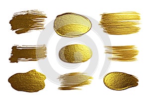 Gold Paint Strokes and Dabs Isolated on White