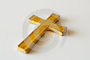 gold paint wooden holy cross on white background