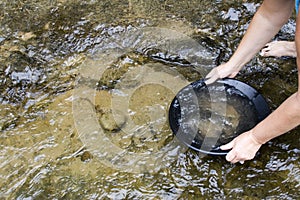 Gold panning for gold photo