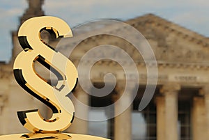 Gold paragraph symbol