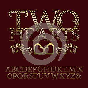 Gold patterned letters with tendrils. Vintage romantic font