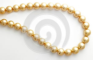 Gold pearl chain