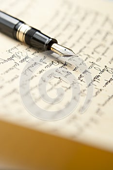 Gold Pen with Letter and Writing