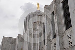 Gold pioneer statue atop the Oregon State Capitol Building