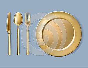 Gold plate, fork, spoon and knife