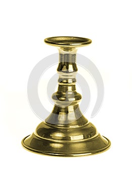 Gold plated candlestick isolated on white background photo