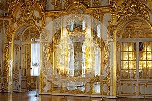 Gold-plated decor elements of the ballroom in the palace of the Russian Tsars